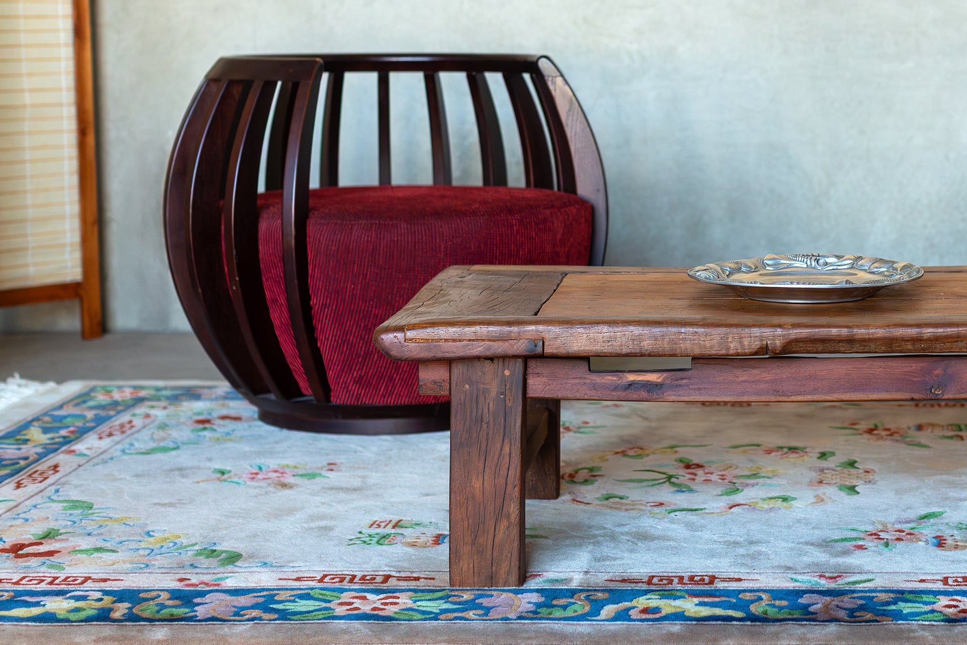 Vintage Bordeaux barrel chair with curved upholstered design