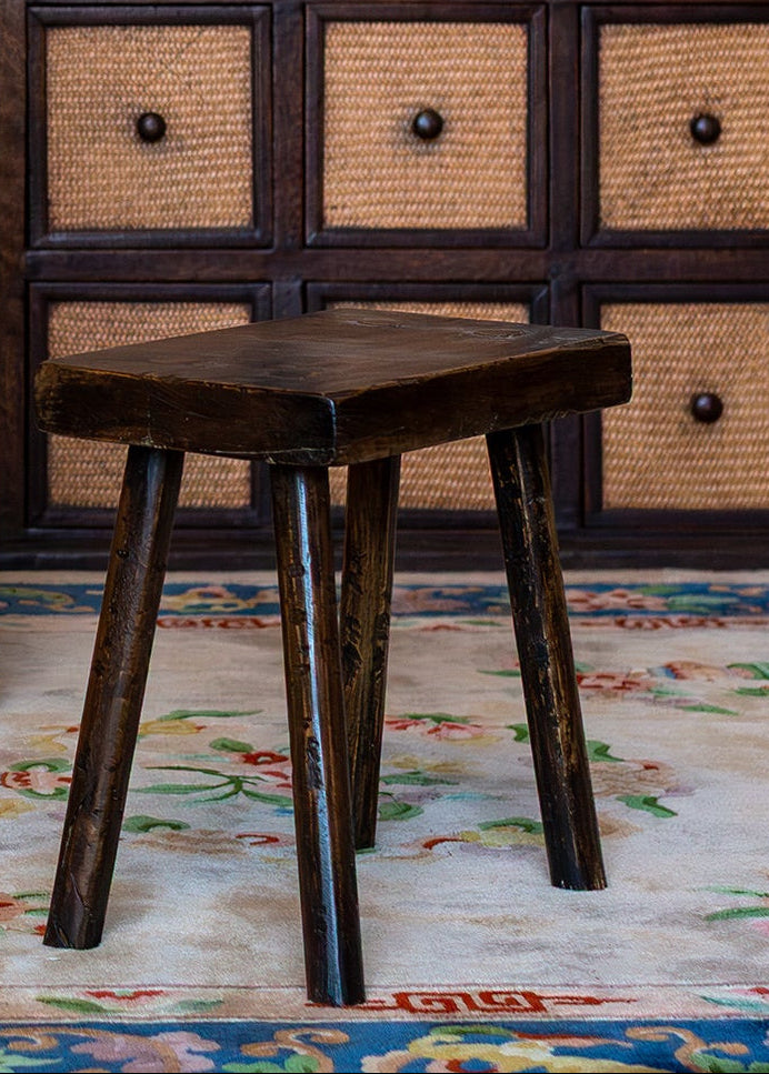 Vintage primitive wooden stool with handcrafted timber finish